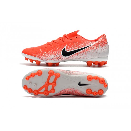 Kopačky Nike Vapor 12 Academy CR7 AG-R oranžový Bílý